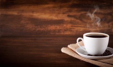 Coffee on wood background