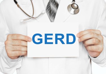 GERD card in hands of Medical Doctor
