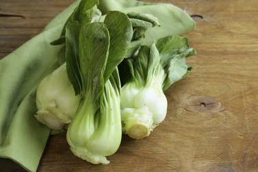 Bok choy (chinese cabbage) on a wooden table
