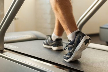 Exercising on treadmill.