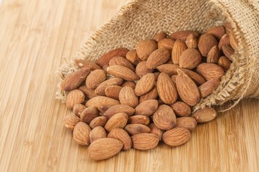 Almonds in a brown straw sack