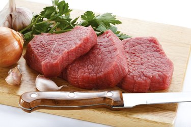 Fresh raw beef on cutting board