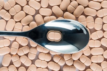 medicine pill over silver spoon, Healthcare and Medicine