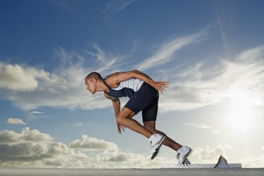 Runner leaving starting blocks