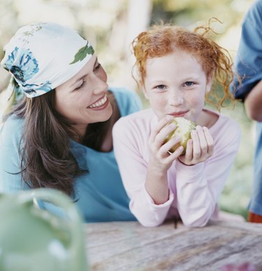 Portrait of a Young Girl and Her Mother, Girl Eating an Apple