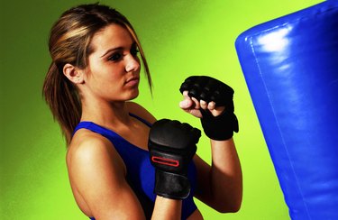 Woman practicing boxing