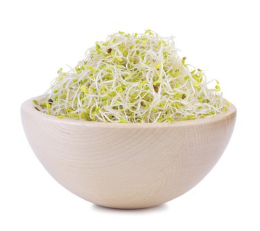 Blend of broccoli, alfalfa, clover and radish sprouts in wooden