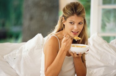 Woman eating cereal