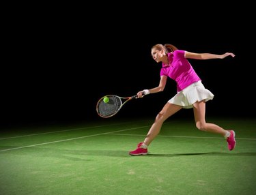 Young woman tennis player isolated