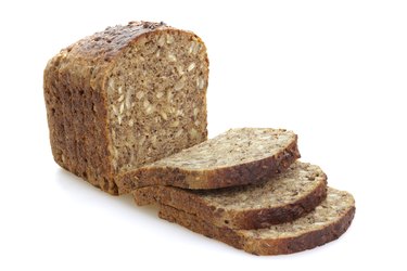 Sliced brown bread with cereals.