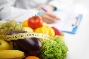 Doctor dietitian writing