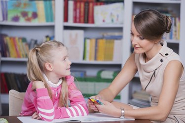 Child psychologist with a little girl