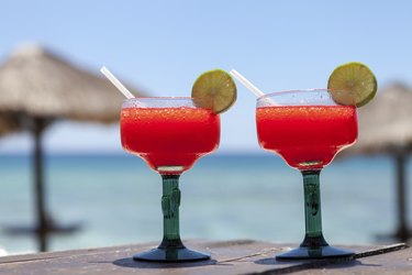 Frozen strawberry margaritas on the beach