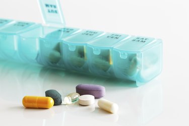 Weekly container of tablets, vitamins etc