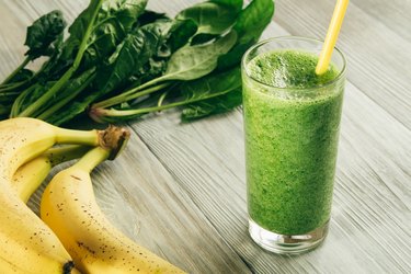 Green Smoothies of spinach and banana in a glass