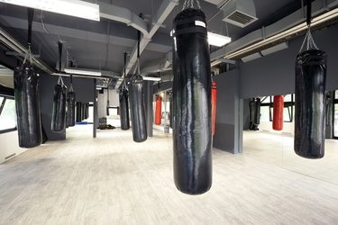 Punching bags in spacious gym