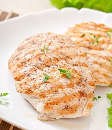 Grilled chicken breasts and vegetables