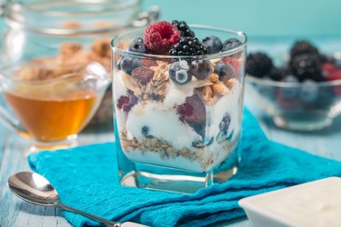 bowl of muesli and yogurt with fresh berries