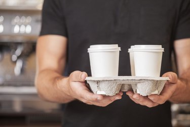 Man carrying tray of coffees