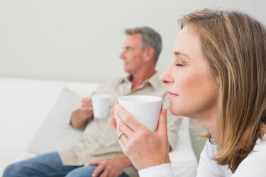 Relaxed couple with coffee cups