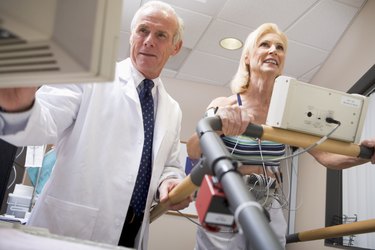 Doctor With Patient During Health Check