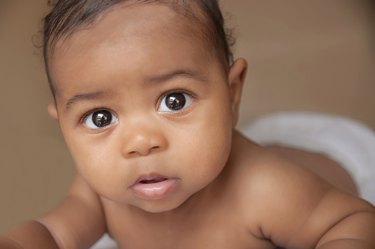 4 month old baby laying down