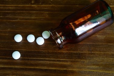 Tablets and a small bottle