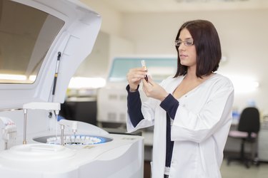 Young woman in the medical laboratory