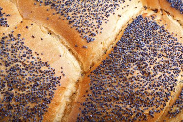 Close image of bread with poppy seeds on top to show khus khus benefits