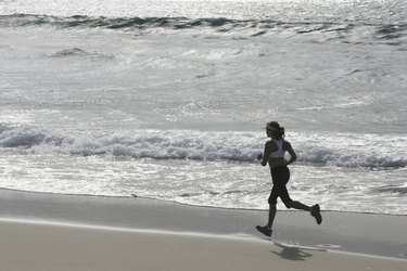 Woman running on beach