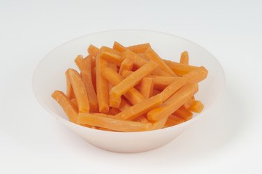 Bowl of carrots, studio shot