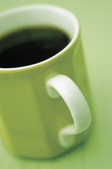 Black coffee in green mug