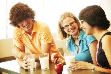 Group of teenagers eating