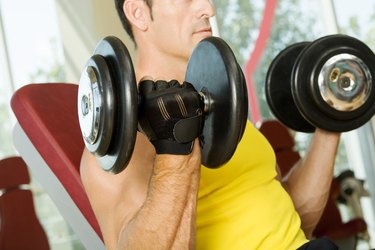 Man using hand weights