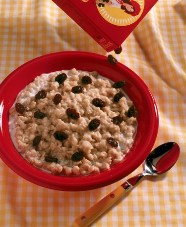 Raisins pouring over oatmeal