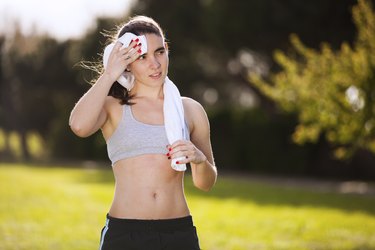 Woman refreshing atfer running