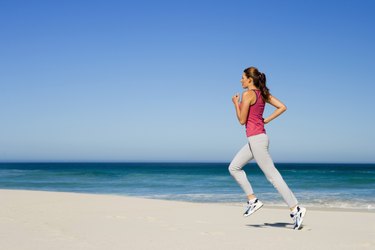 Woman running on beach