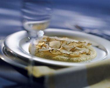 Polenta with cheese on plate