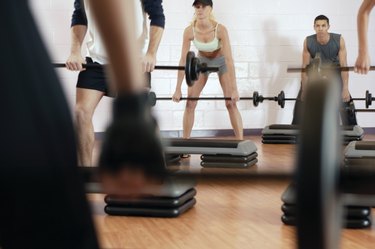 Exercise class lifting weight