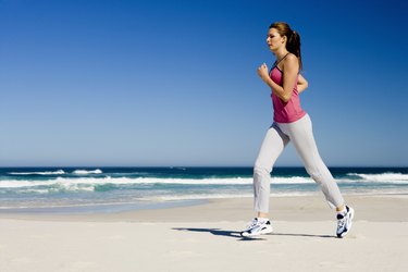 Woman running on beach