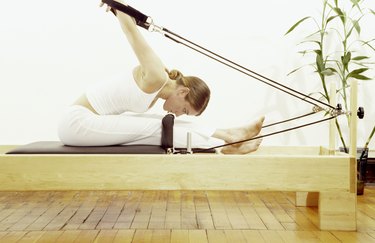 Woman doing Pilates exercises