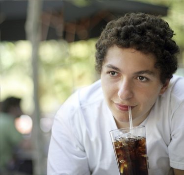 Boy drinking coke