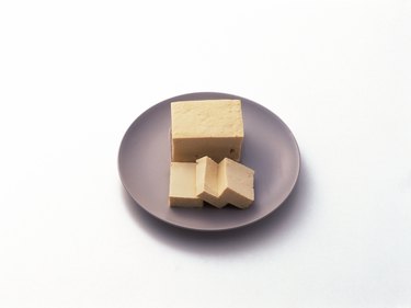 Slices of Tofu on plate, Momen Tofu, high angle view