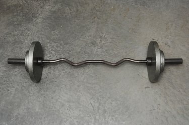 Barbell on concrete floor, overhead view