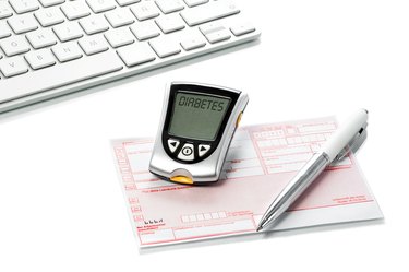 Glucose meter and recipe on the  doctors desk