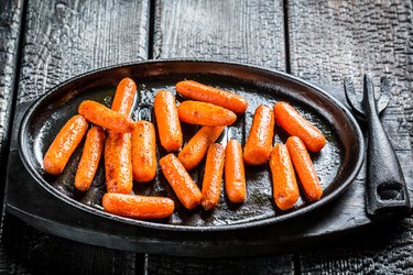 Grilled carrots on grill