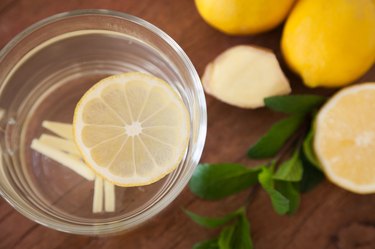 Lemon Ginger Tea with wooden Background