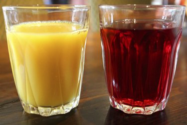 Image of glasses of orange juice and cranberry juice