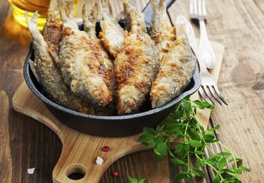 Fried fish in a frying pan