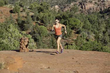 Woman Trail Running Uphills